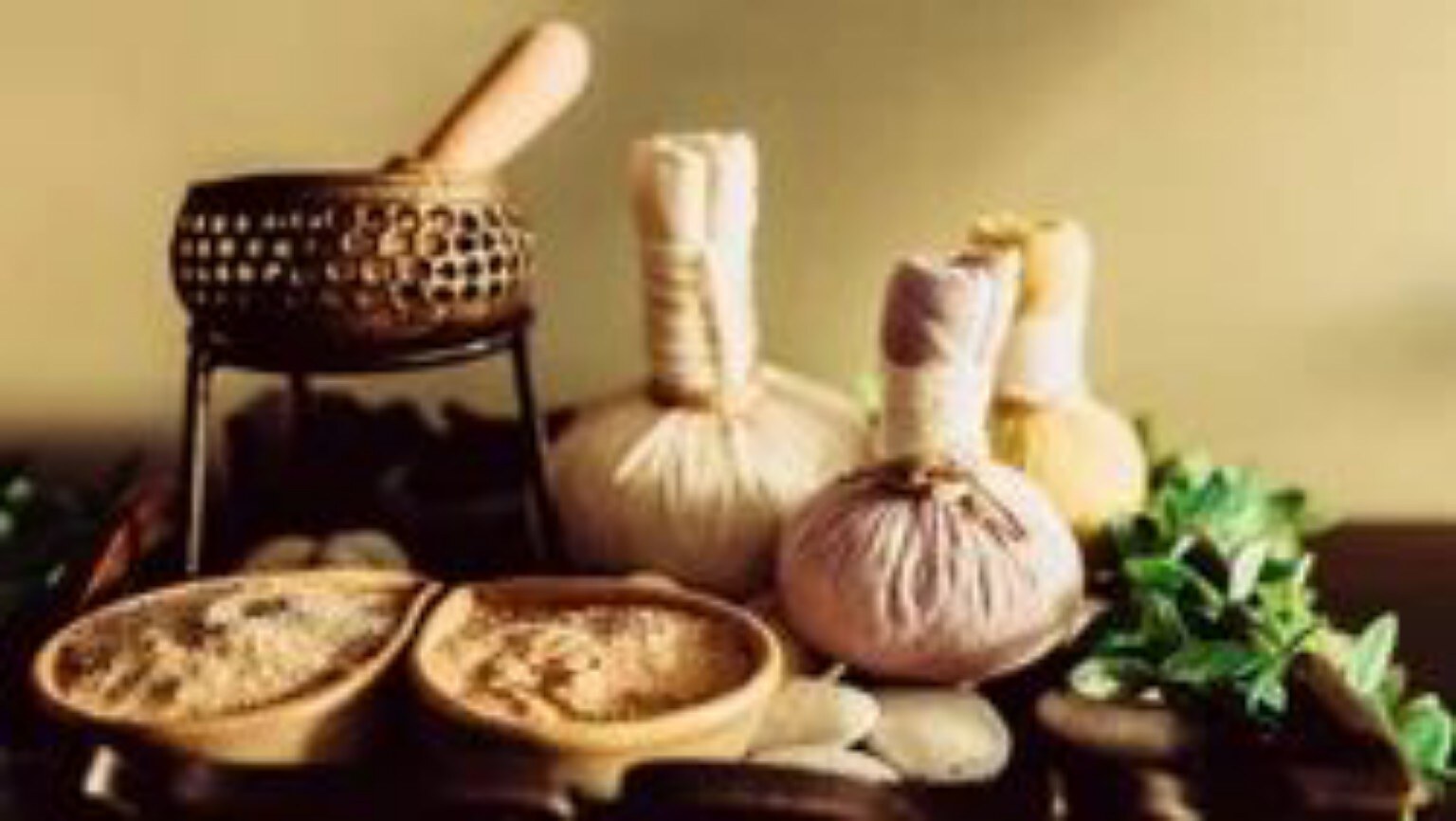 Herbal spice potli and professional spa treatment consumables