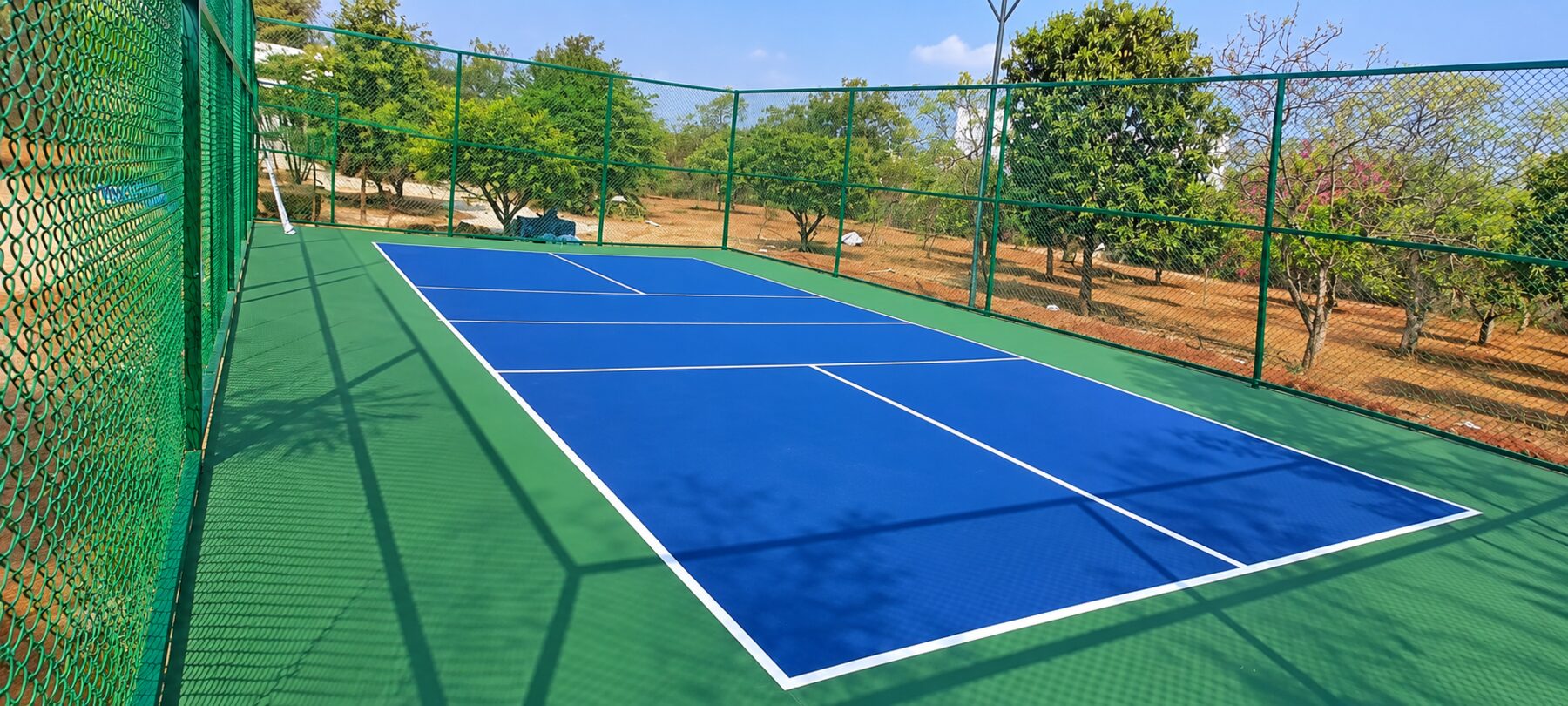 Enclosed outdoor pickleball court