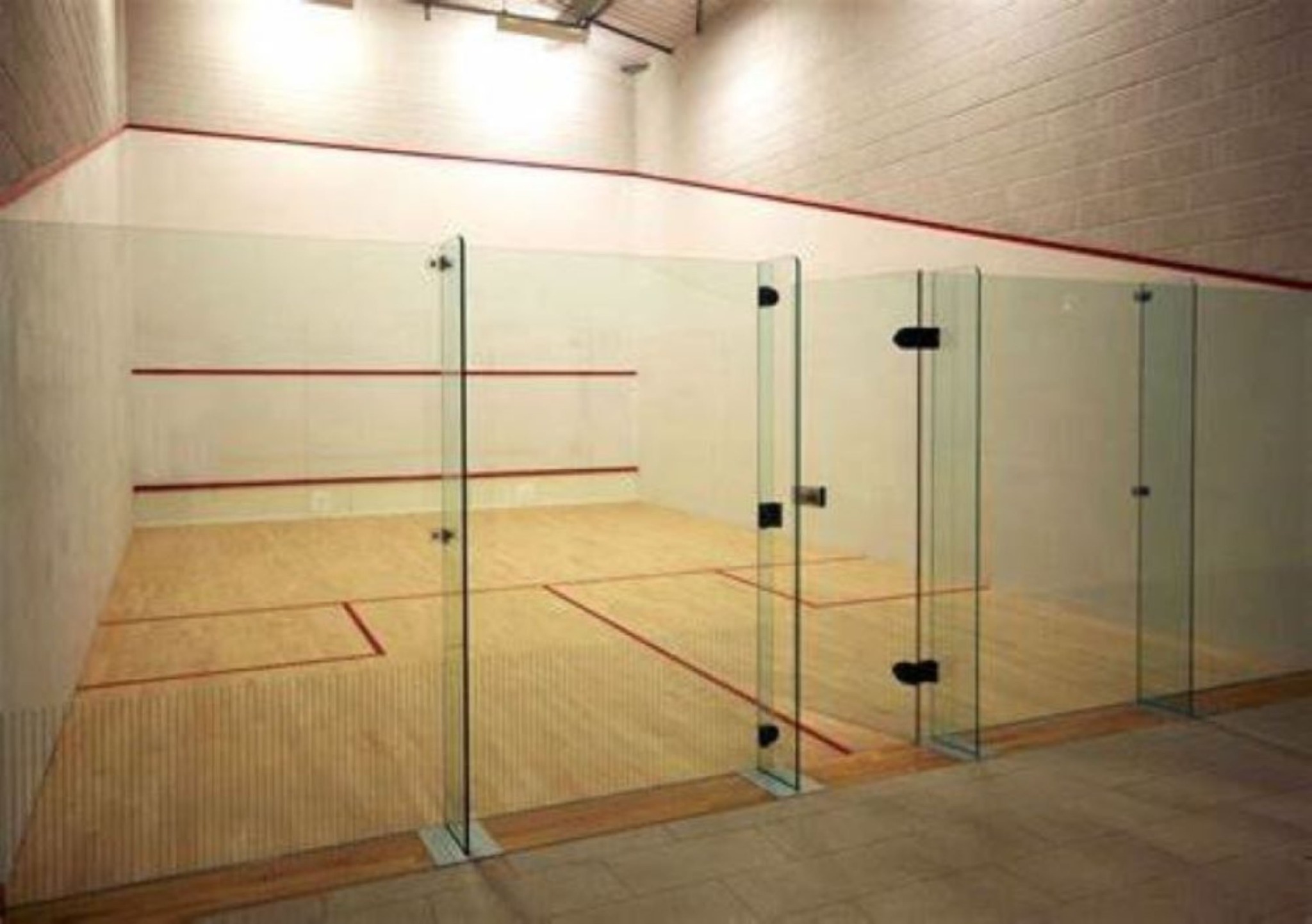 Squash court with maple wood floor